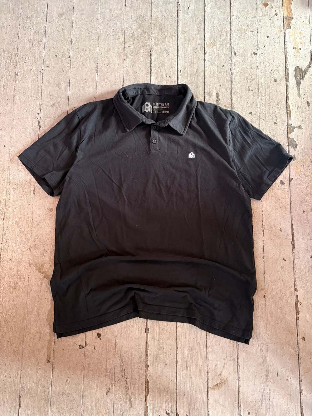 INTO THE AM Men's Black Short Sleeve Polo Shirt